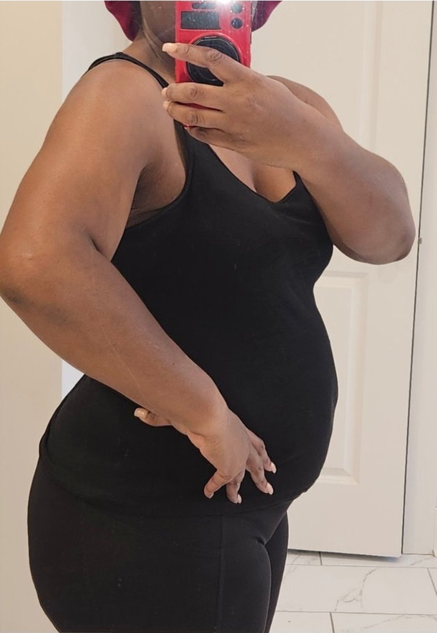 Mirror photo of a Habit42 member on Day 1 of her first cohort, face not shown, at 231.6 pounds.